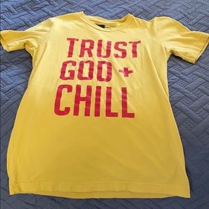 XS “Trust God & Chill” tee.